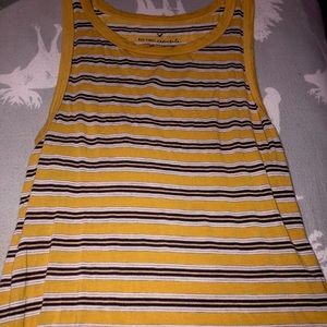 Yellow tank top with dark purple and white stripes